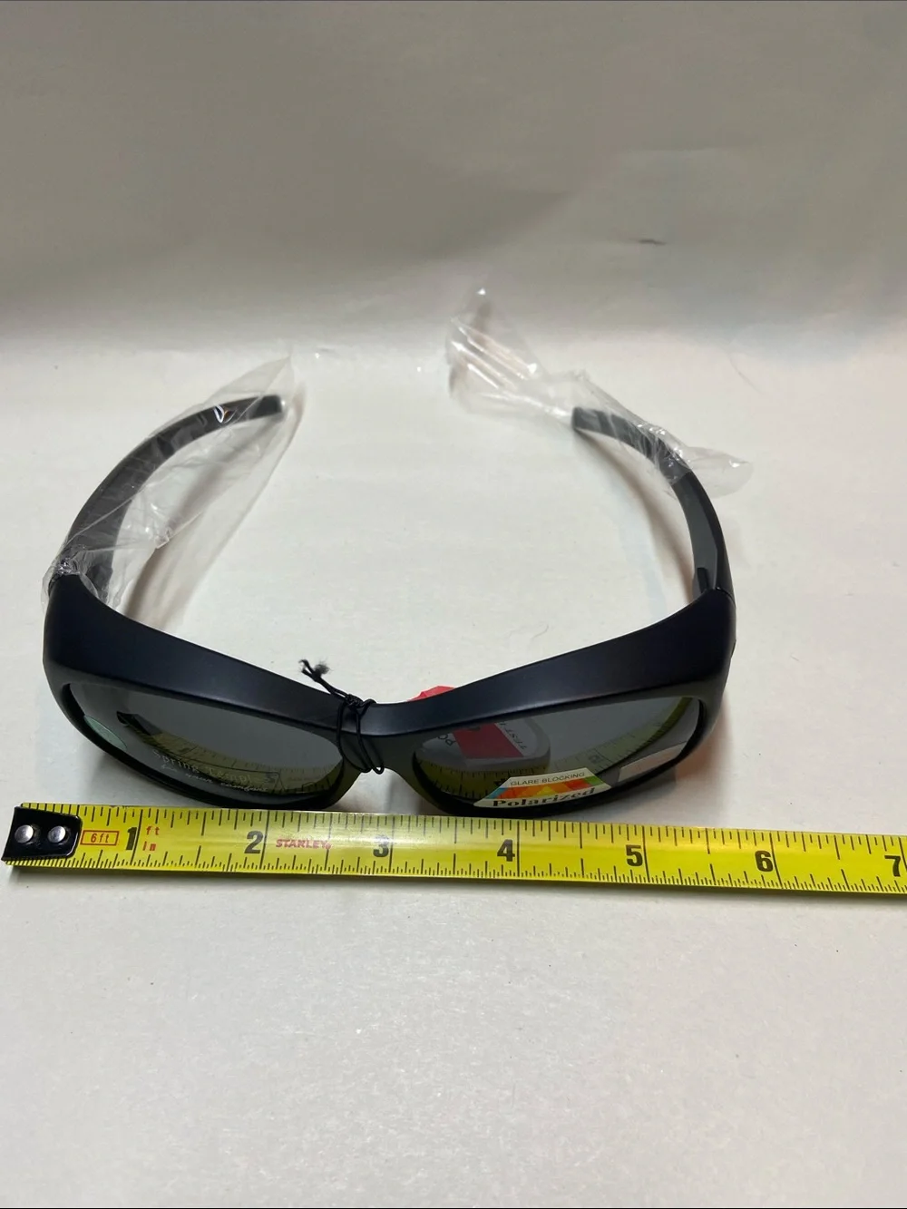Polarized Black Women's Wrap Sunglasses fits over glasses